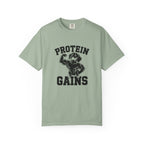 Protein Gains muscle flexing dachshund graphic t-shirt — funny wiener dog gym tee by Doxie League